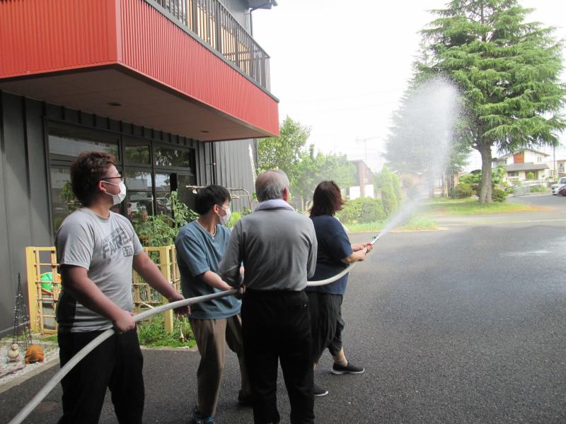 （入居者Aさんと介護職員）